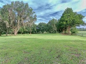 Owner financing available for a 0.63-acre lot with survey and cleared land.